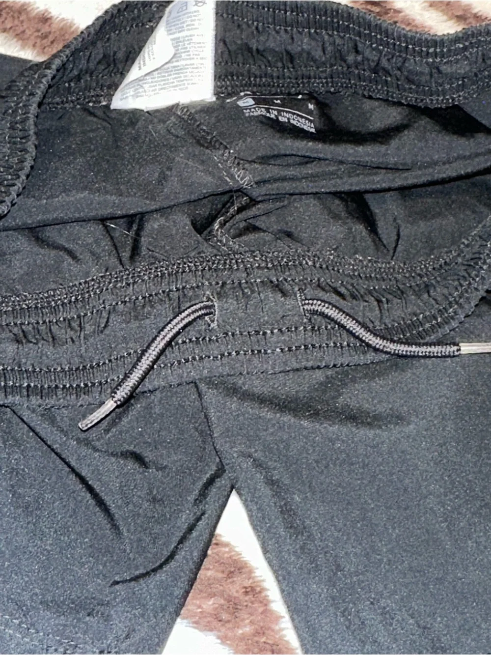 Nike Black Kids Athletic Shorts with White Swoosh